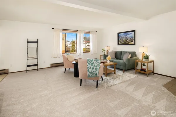 a living room with furniture and a window