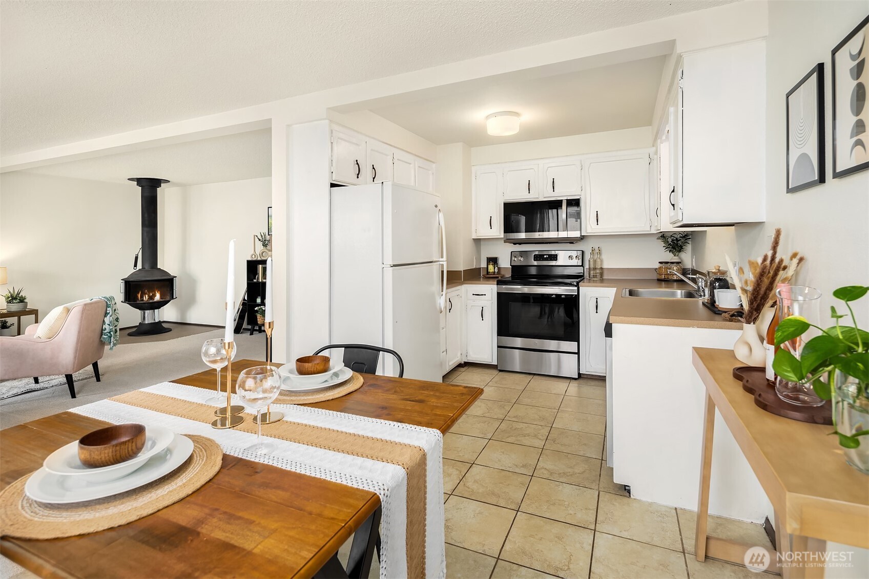 1612 33rd Street, Unit 104 Everett, WA 98201 - Photo 10 of 24 a kitchen with a sink appliances and cabinets