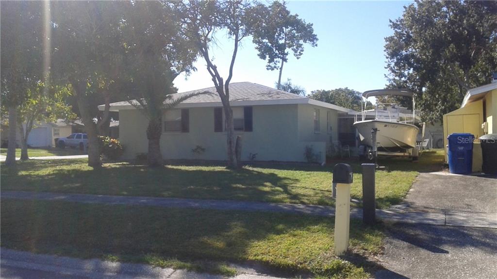 3589 7th Avenue Southeast Largo, FL 33771 - Photo 1 of 1 a backyard of a house with lots of green space