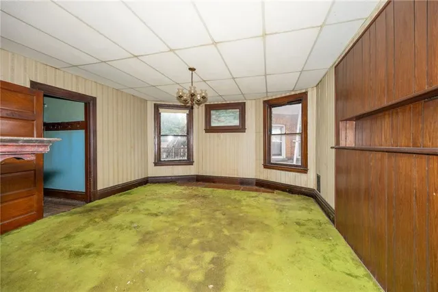 a kitchen with a stove and a refrigerator