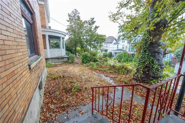 a view of a porch with a yard