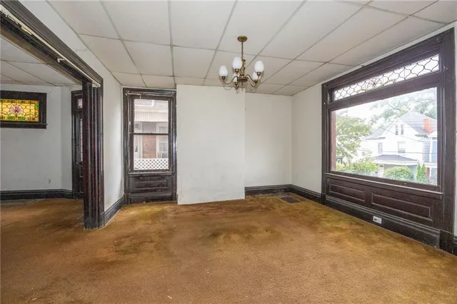 a view of empty room with closet