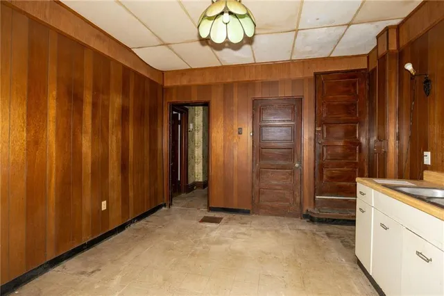 a kitchen with a refrigerator a sink and dishwasher