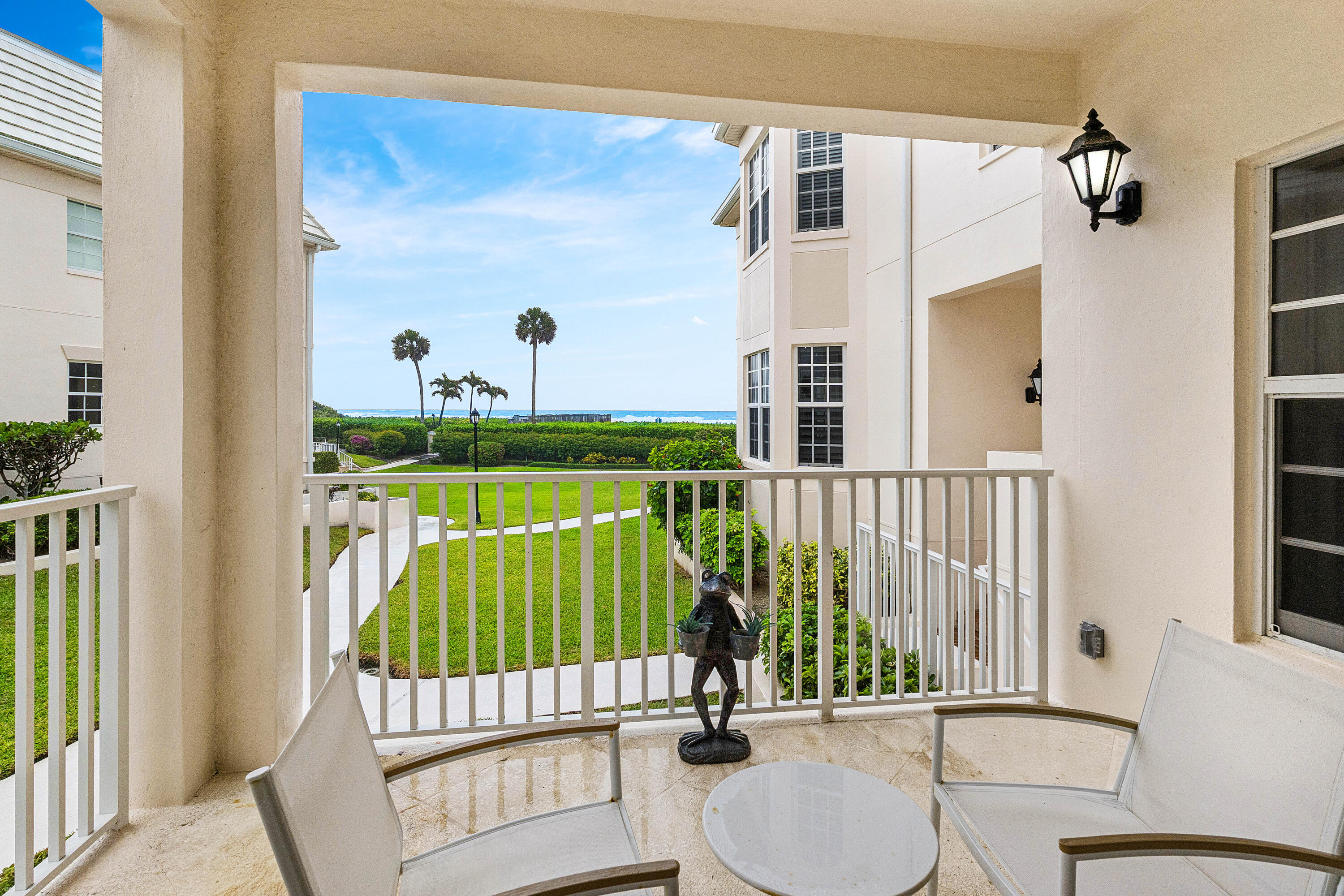 a view of a balcony with furniture
