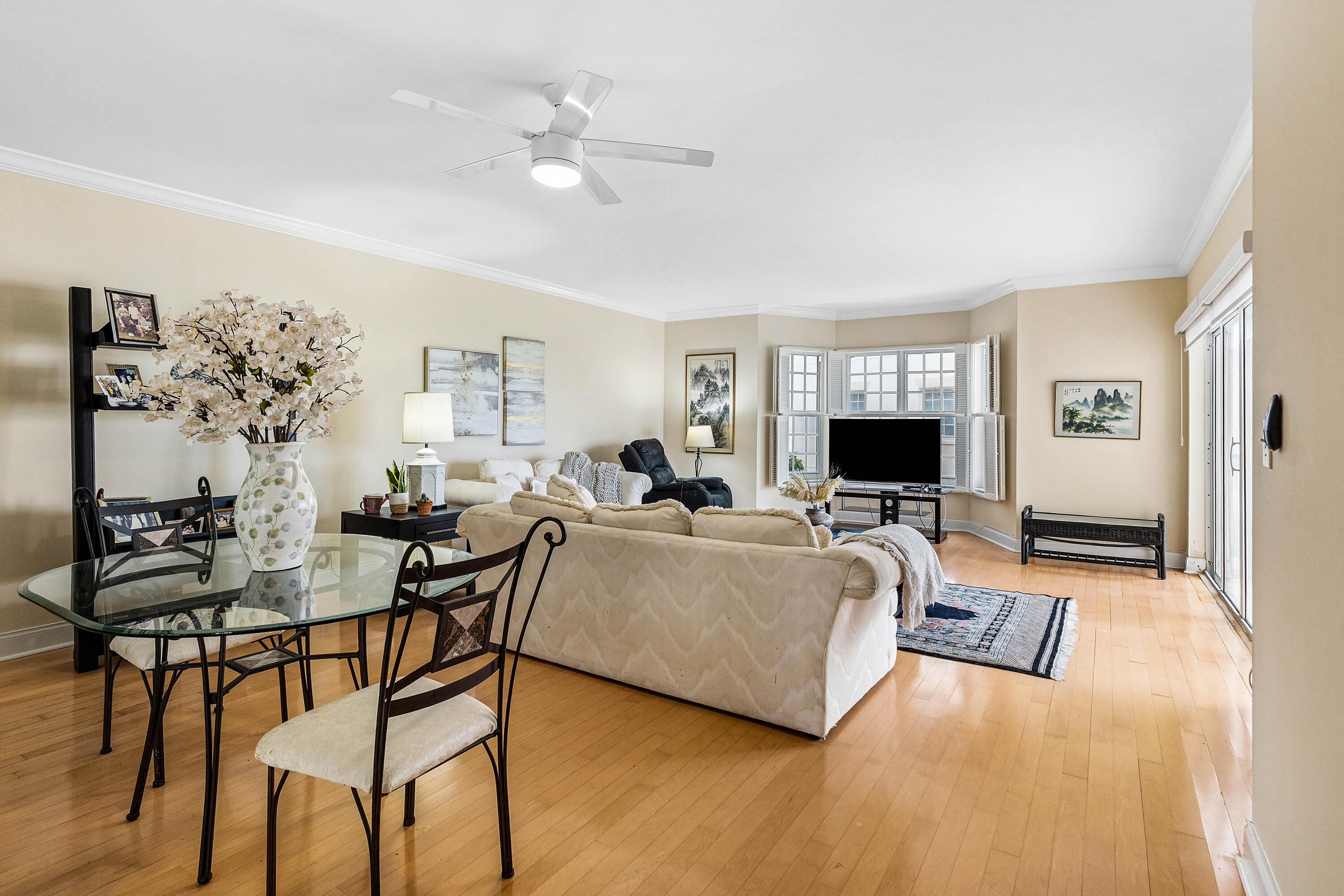 5900 Old Ocean Boulevard, Unit C5 Ocean Ridge, FL 33435 - Photo 2 of 17 a living room with furniture and a flat screen tv
