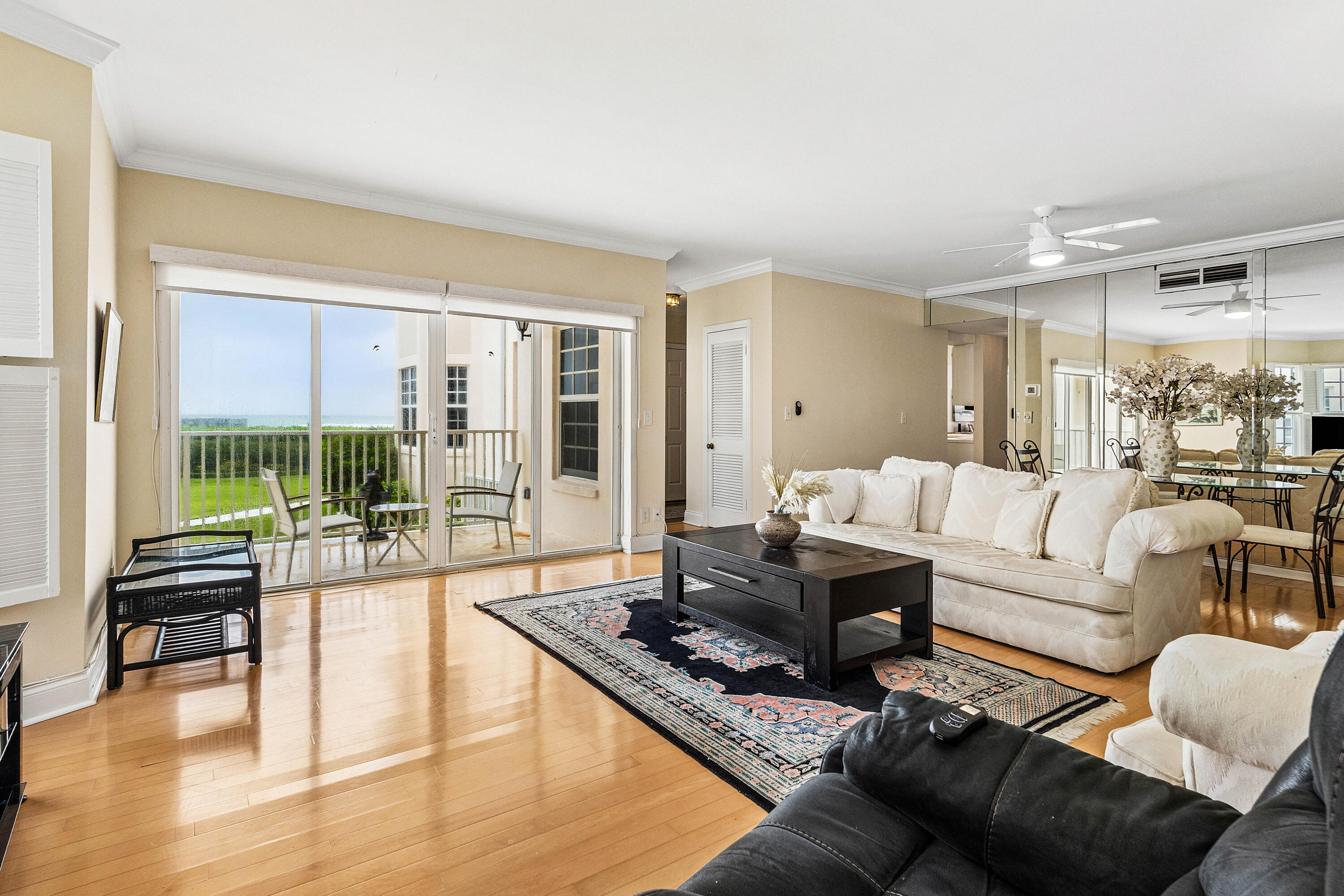 5900 Old Ocean Boulevard, Unit C5 Ocean Ridge, FL 33435 - Photo 3 of 17 a living room with furniture and a large window
