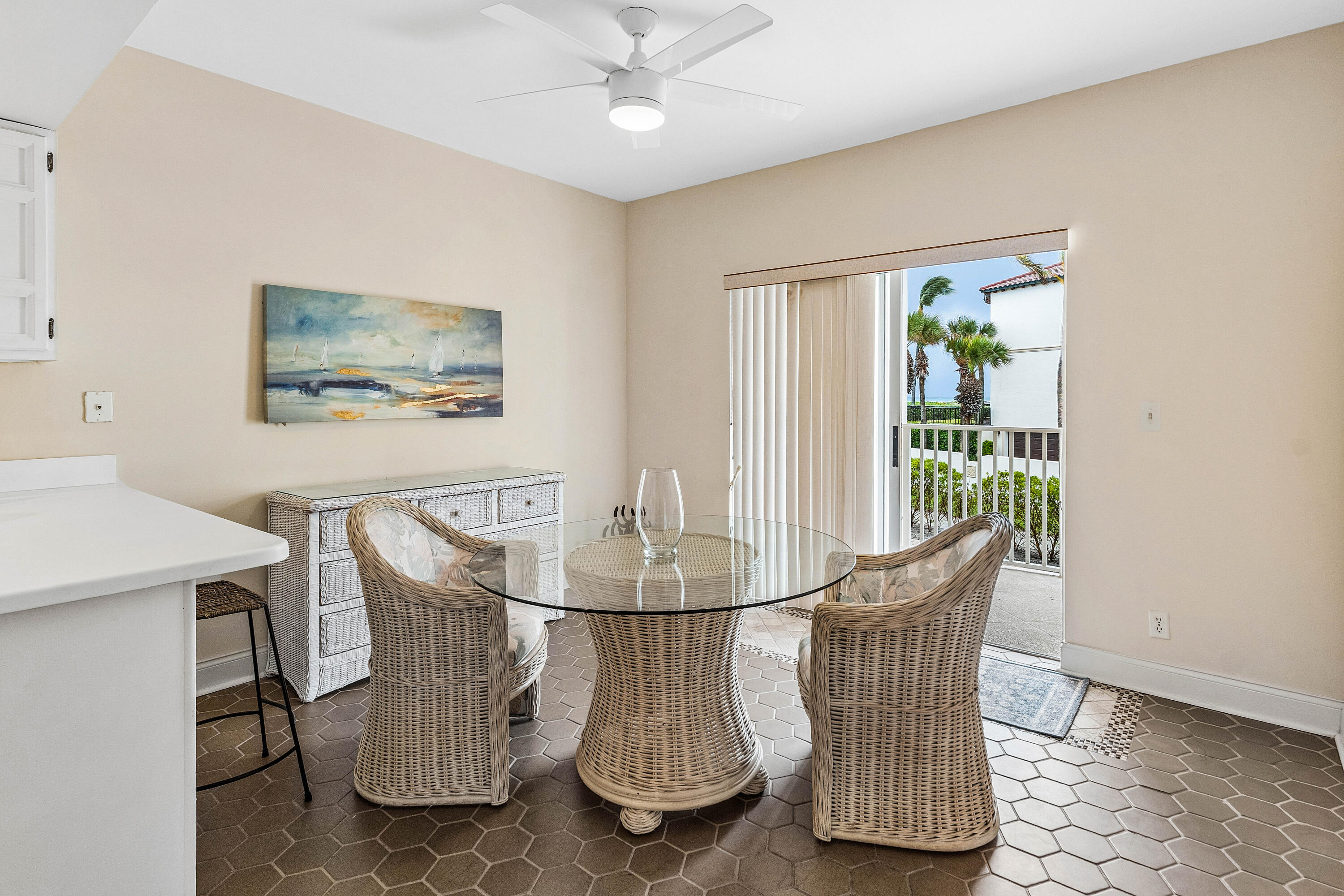 5900 Old Ocean Boulevard, Unit C5 Ocean Ridge, FL 33435 - Photo 6 of 17 a dining room with furniture and window