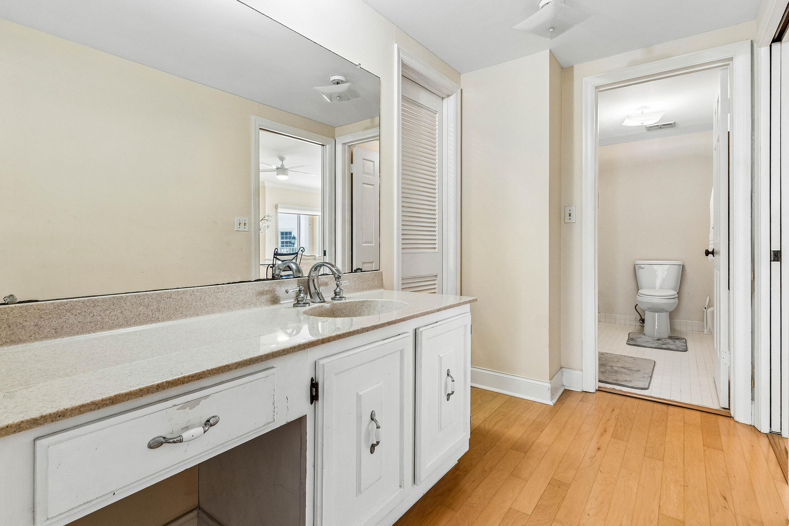 5900 Old Ocean Boulevard, Unit C5 Ocean Ridge, FL 33435 - Photo 9 of 17 a spacious bathroom with a sink and a mirror