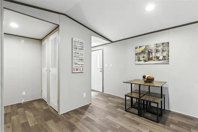 a workspace with furniture and wooden floor