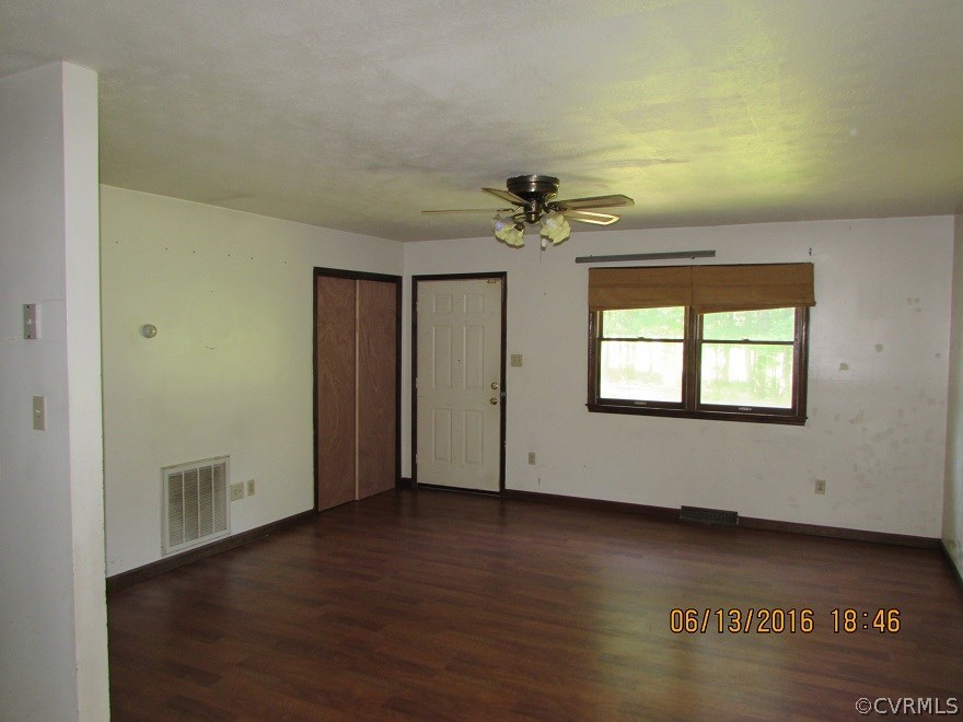 660 Cooks Road Farmville, VA 23901 - Photo 15 of 18 wooden floor in an empty room with a window