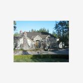 a picture of a house with a yard