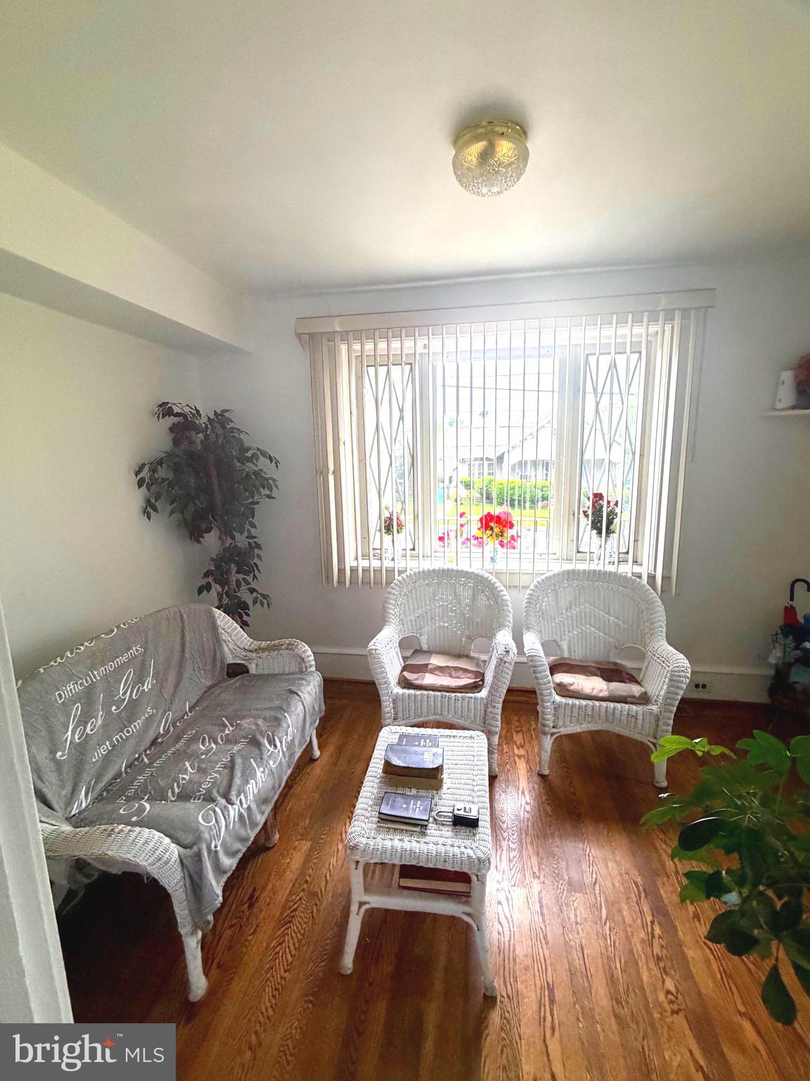 463 Burmont Road Drexel Hill, PA 19026 - Photo 16 of 39 a living room with furniture and a wooden floor