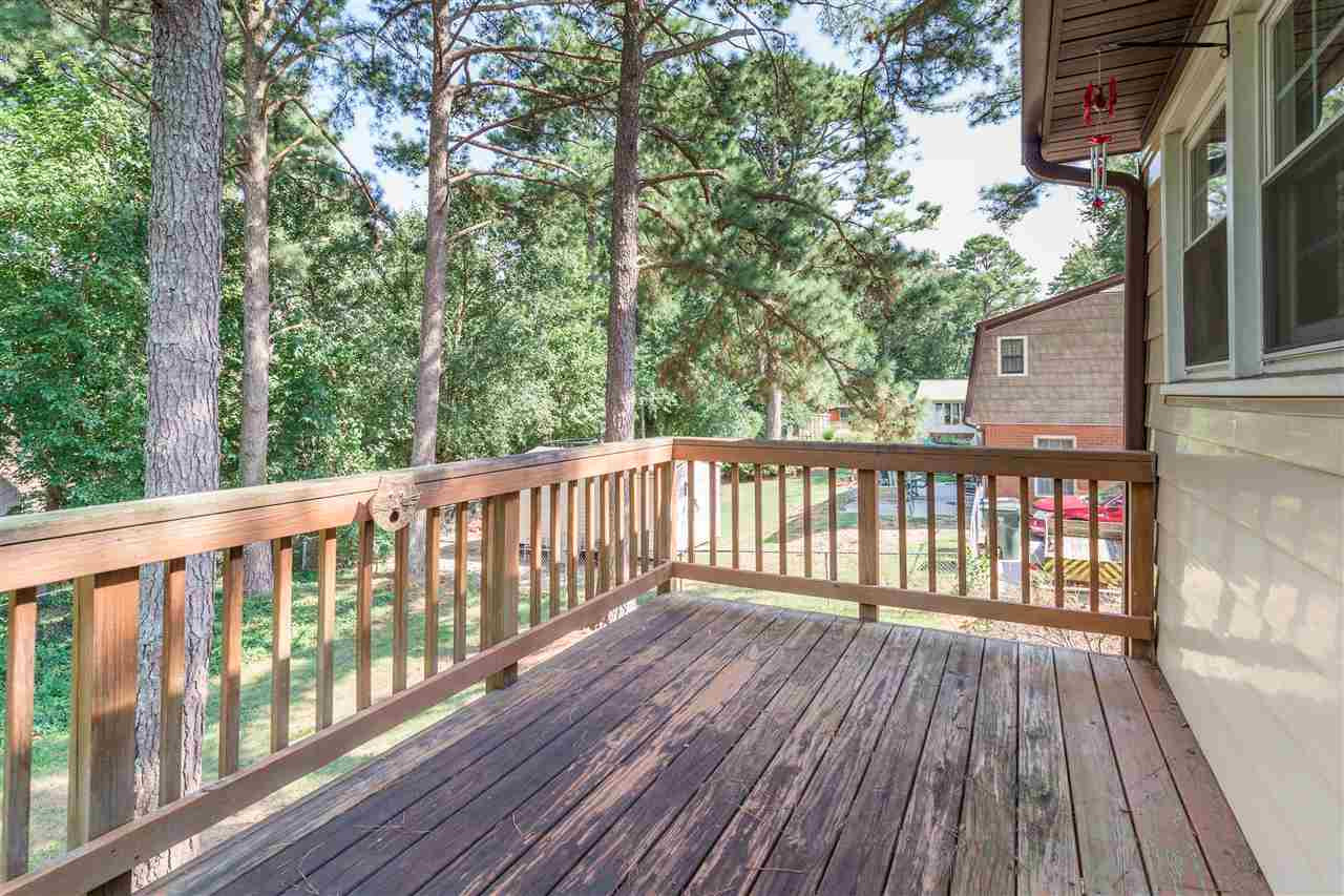 709 Merrie Road Raleigh, NC 27606 - Photo 25 of 30 Enjoy looking out over a spacious back yard. Perfect for enjoying your morning coffee and bird watching or an evening beverage with some star gazing. Back Deck