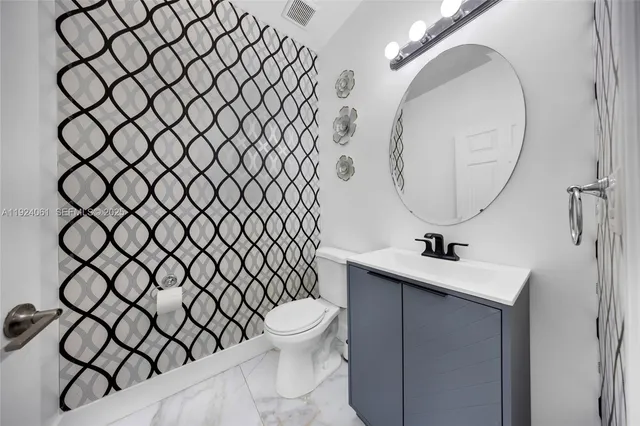 an empty room with a empty space and windows