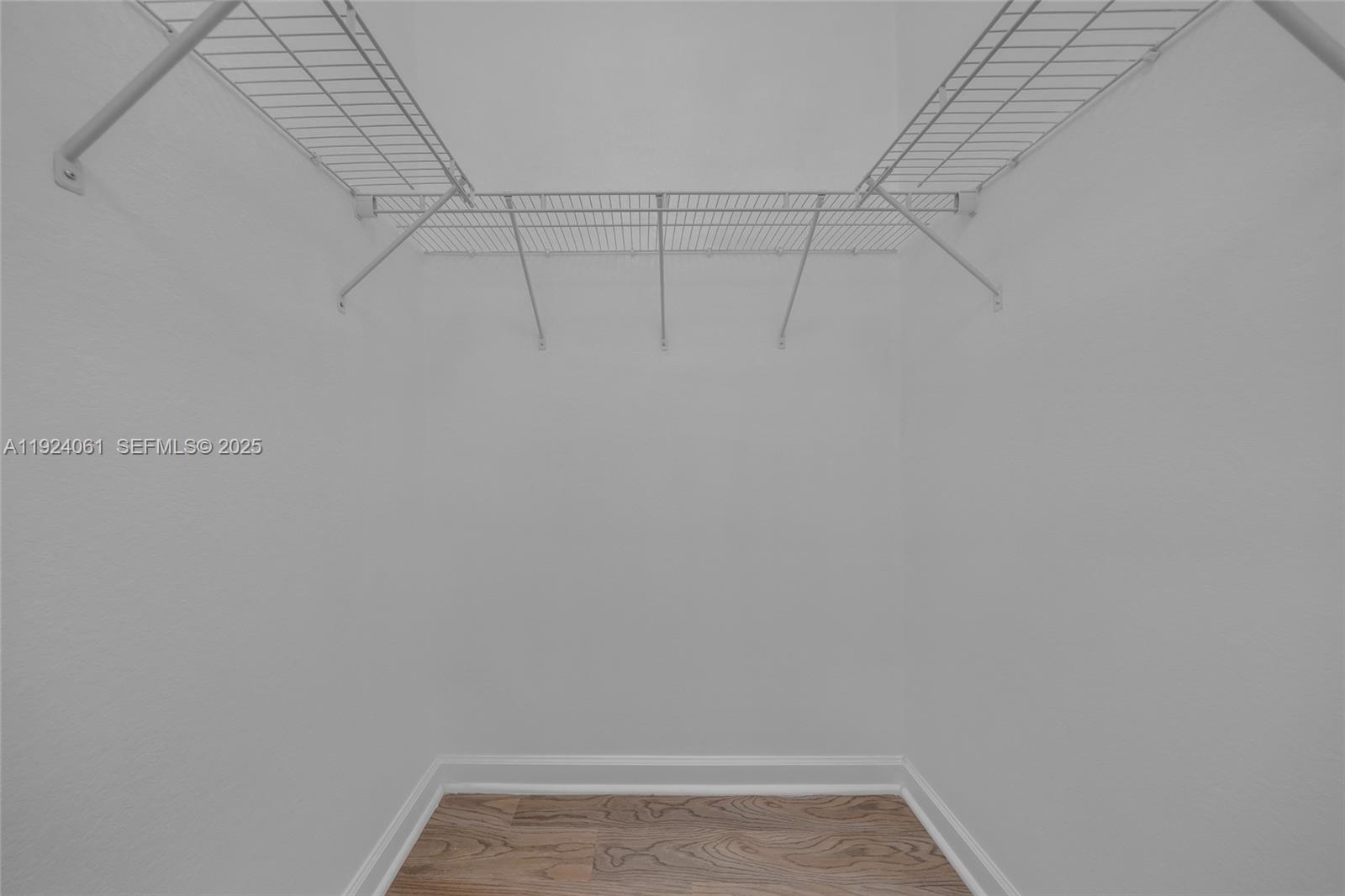 268 Northeast 210th Way Miami, FL 33179 - Photo 50 of 98 a view of a room with racks on the wall