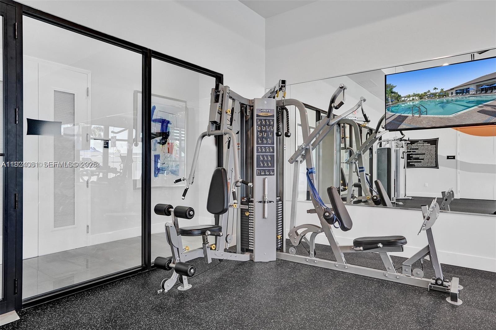 268 Northeast 210th Way Miami, FL 33179 - Photo 73 of 98 a view of a room with gym equipment