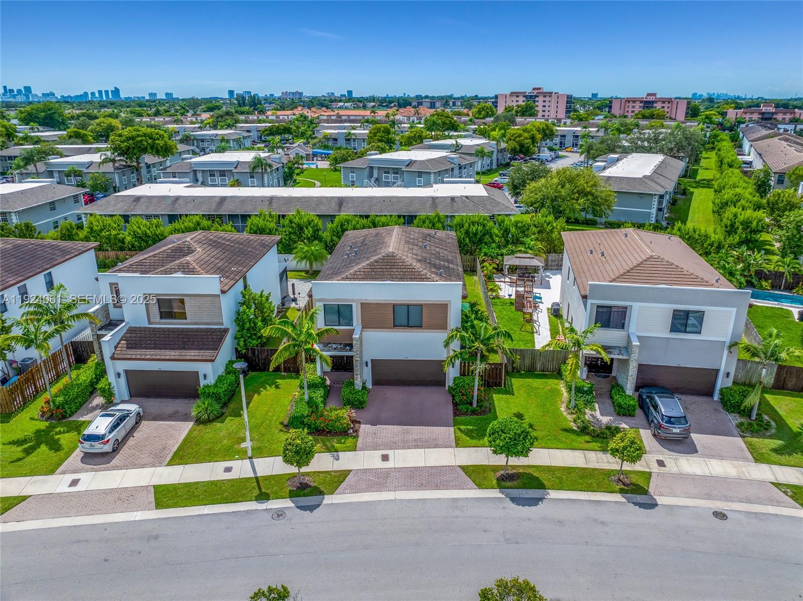 268 Northeast 210th Way Miami, FL 33179 - Photo 87 of 98 an aerial view of multiple houses