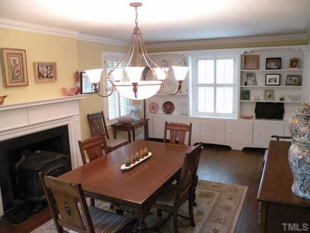 2405 Stafford Avenue Raleigh, NC 27607 - Photo 5 of 24 Plantation shutters. Dining opens to porch. Dining Room