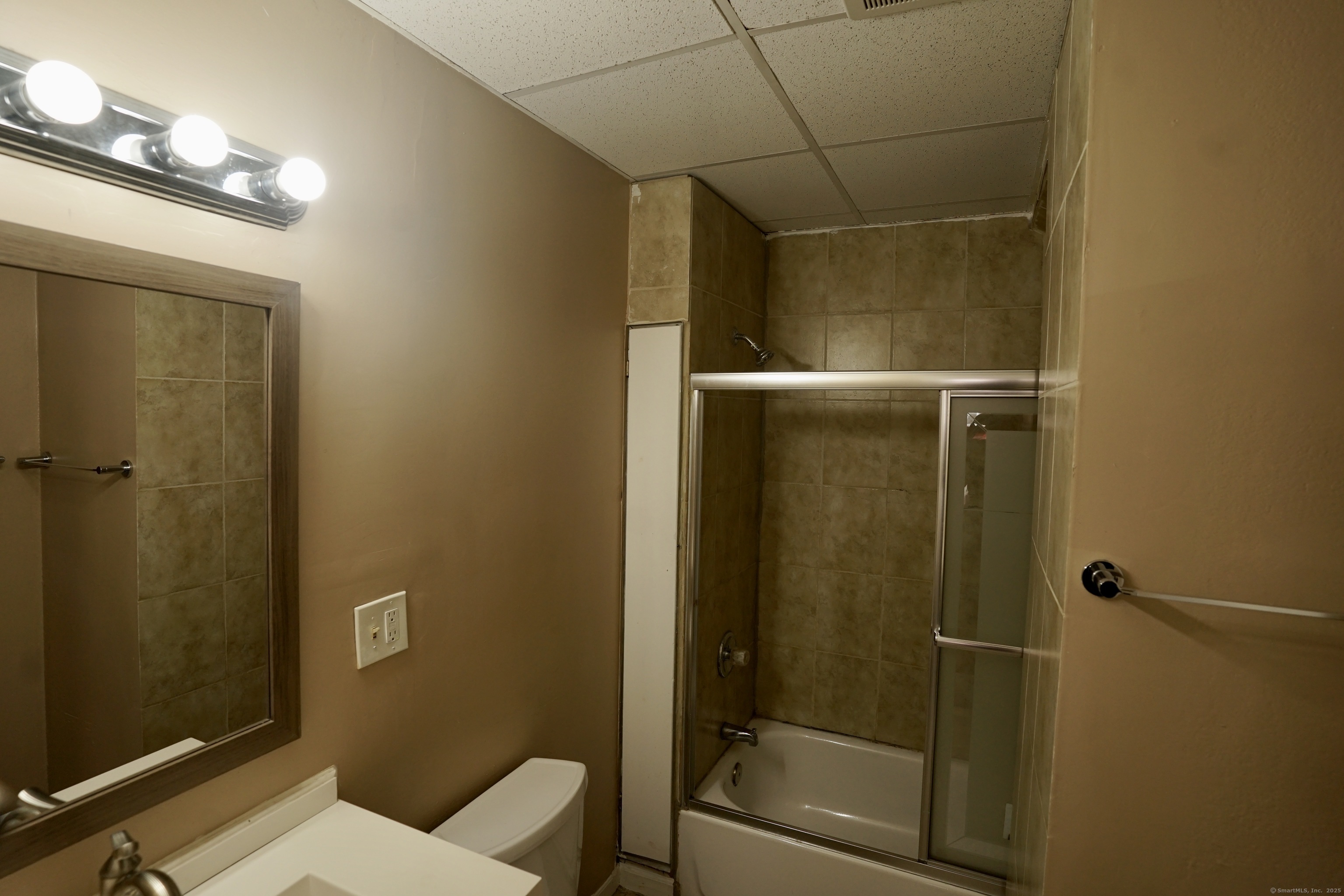 744 Boston Avenue Bridgeport, CT 06610 - Photo 7 of 10 a bathroom with a shower