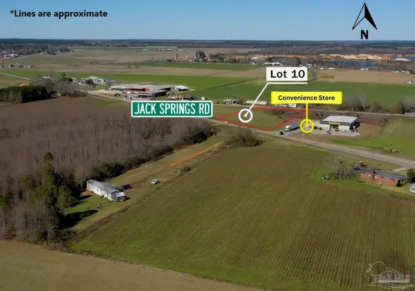 a view of a swimming pool and an outdoor seating