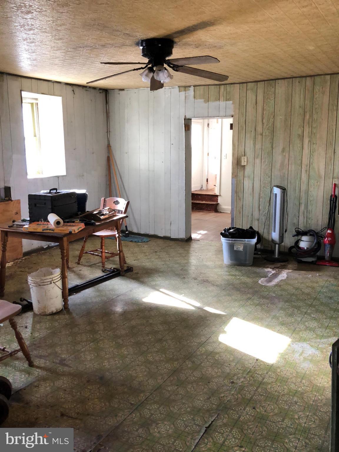 21005 Reno Monument Road Boonsboro, MD 21713 - Photo 22 of 30 a living room with patio furniture and a window
