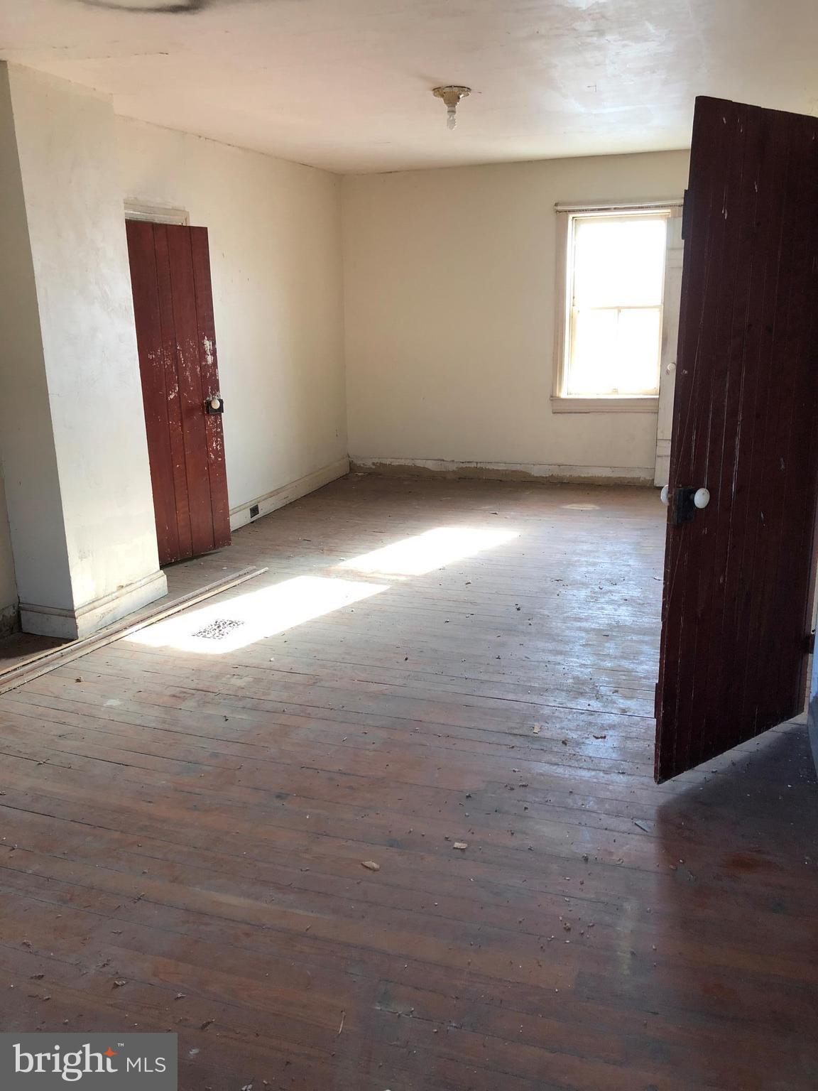 21005 Reno Monument Road Boonsboro, MD 21713 - Photo 26 of 30 an empty room with windows and closet