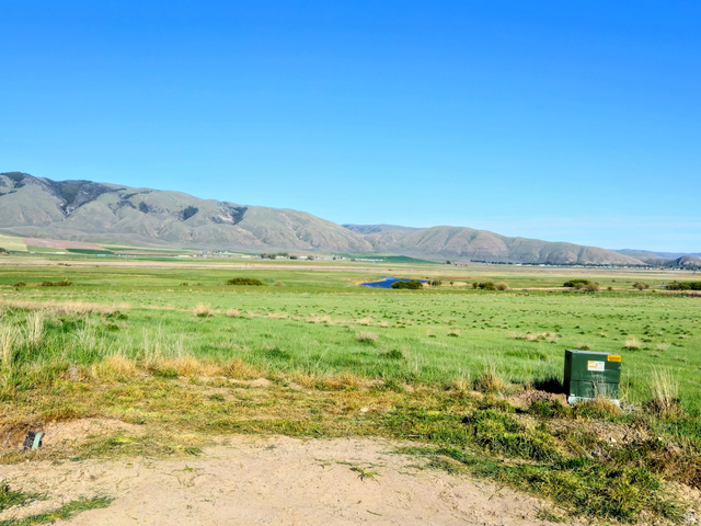 1894 Lower Bern Road, Unit 4 Bern, ID 83220 - Photo 1 of 7 Expansive green landscape with distant mountains