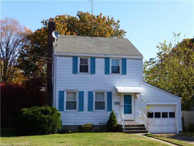 a view of house with yard