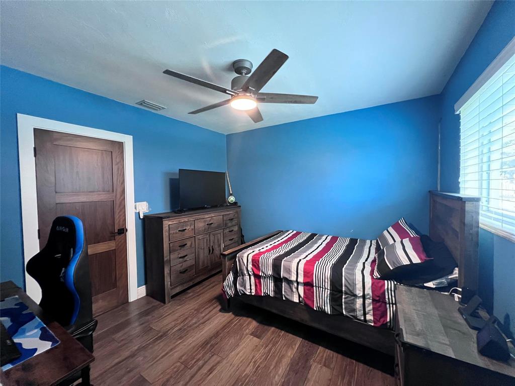 3300 Bridge Road Cooper City, FL 33026 - Photo 13 of 30 a bedroom with a bed and a television in it