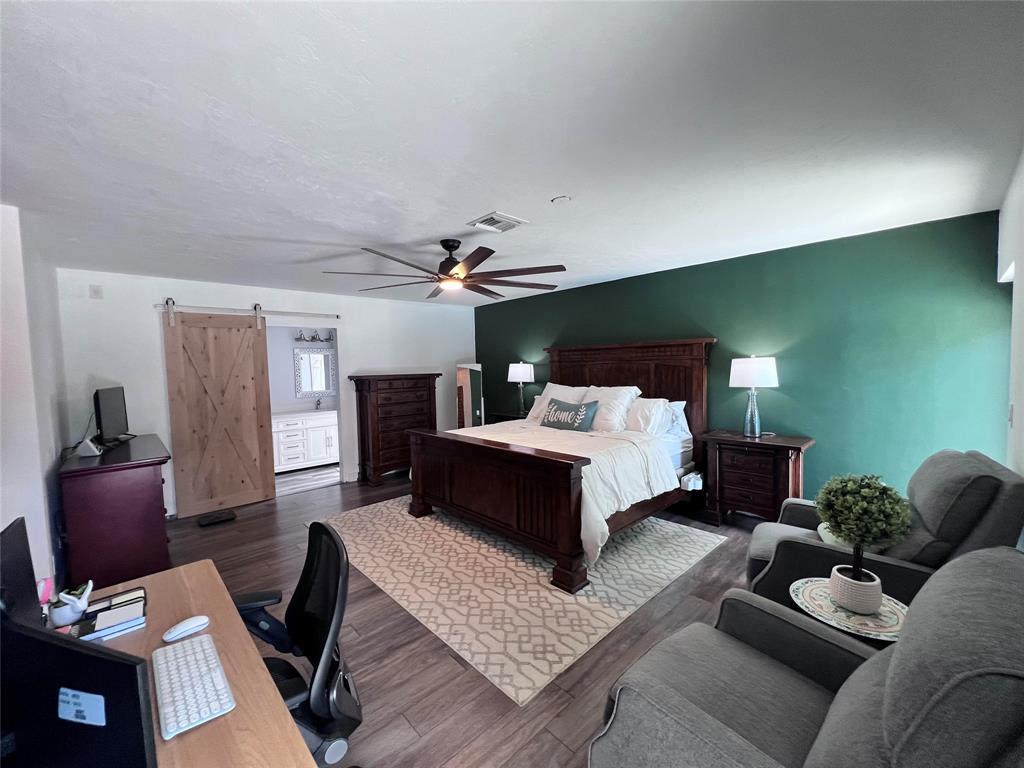 3300 Bridge Road Cooper City, FL 33026 - Photo 17 of 30 a bed room with a bed window and a couch