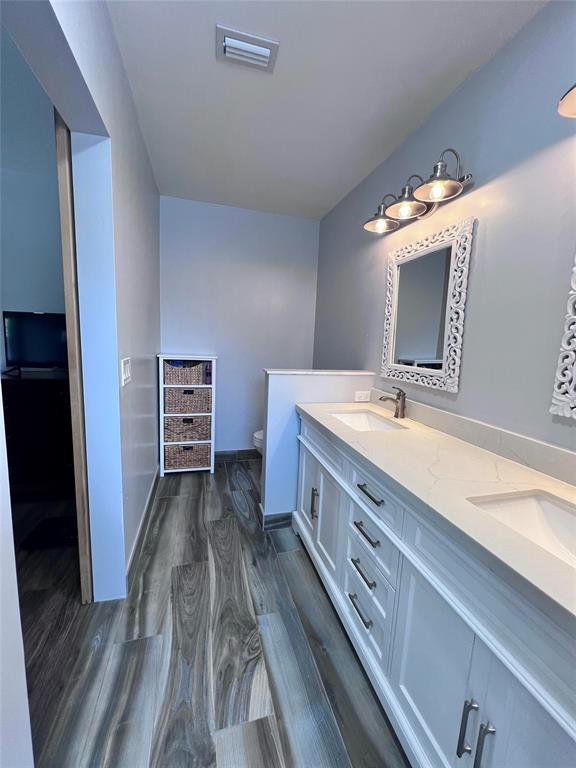 3300 Bridge Road Cooper City, FL 33026 - Photo 18 of 30 a bathroom with a double vanity sink and mirror