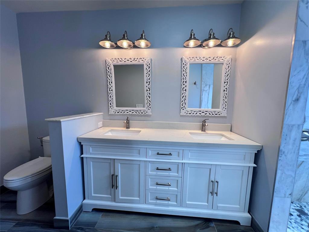 3300 Bridge Road Cooper City, FL 33026 - Photo 20 of 30 a bathroom with a sink and a mirror