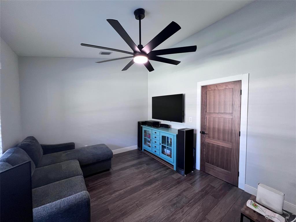 3300 Bridge Road Cooper City, FL 33026 - Photo 21 of 30 a living room with furniture and a flat screen tv