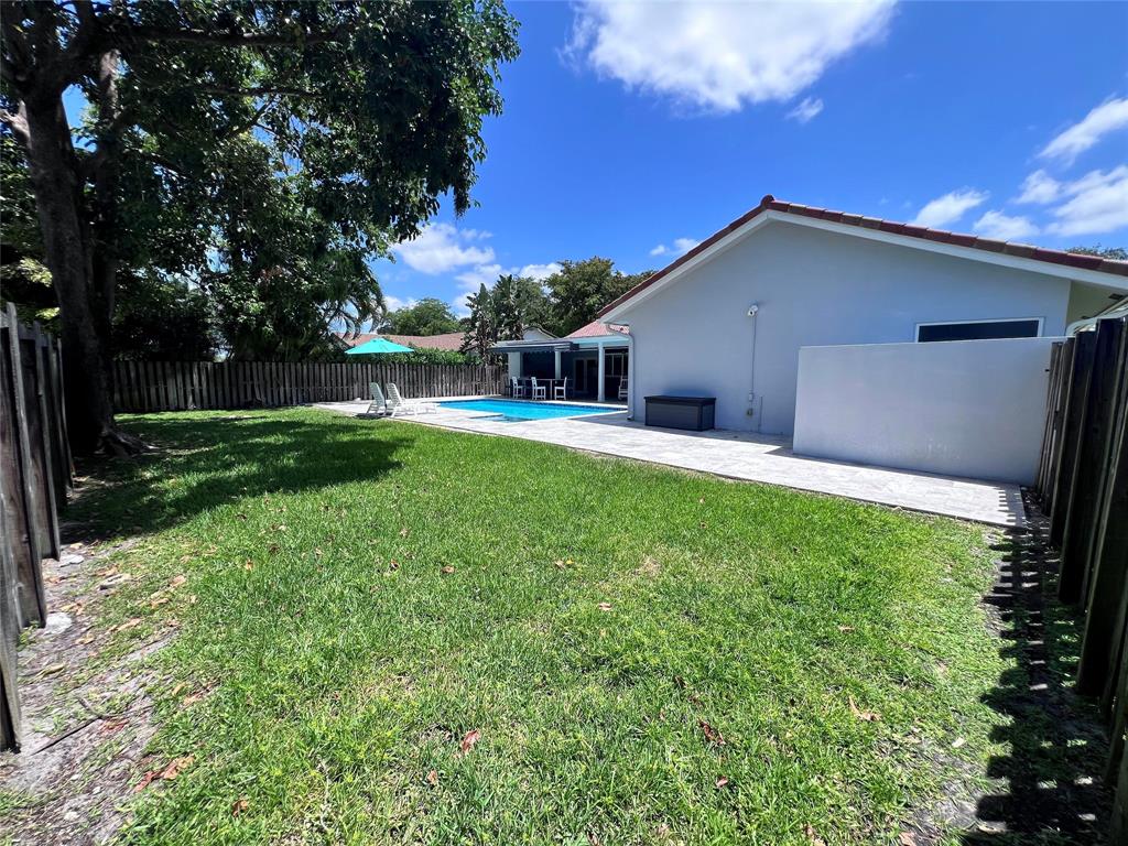 3300 Bridge Road Cooper City, FL 33026 - Photo 26 of 30 a house view with a garden space