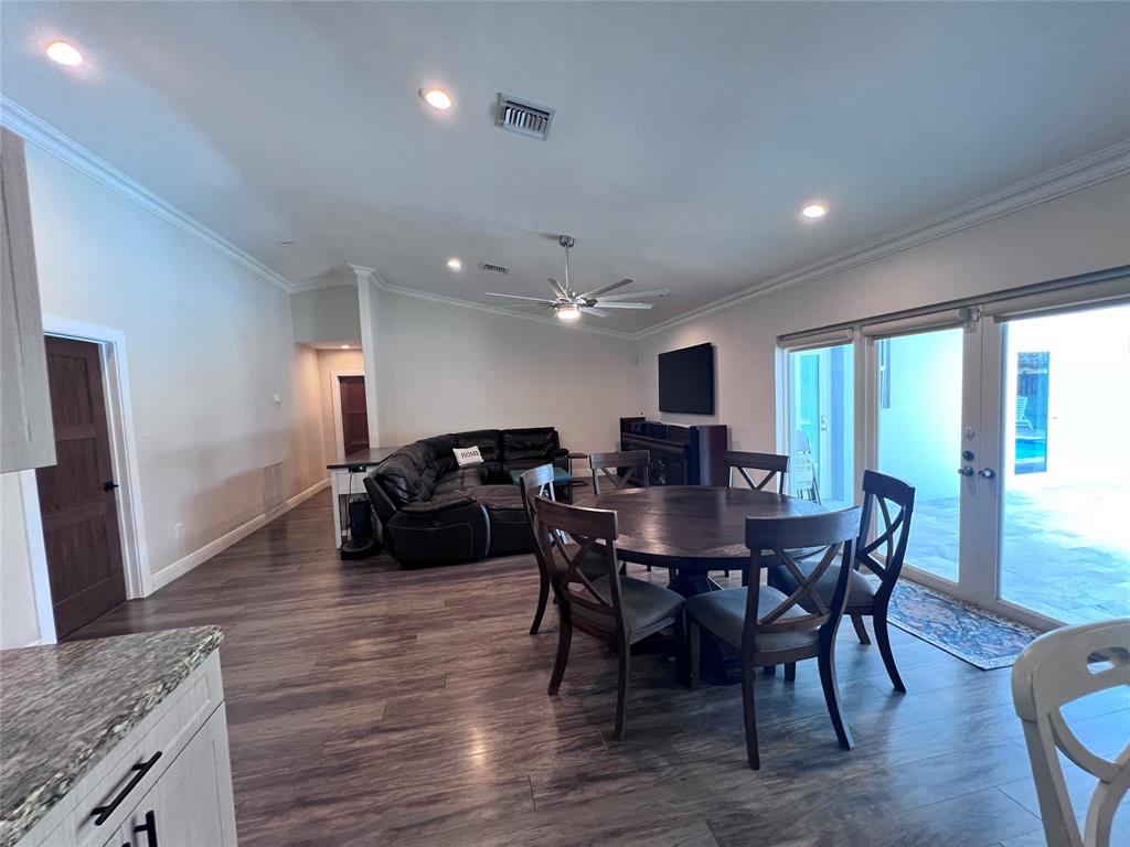 3300 Bridge Road Cooper City, FL 33026 - Photo 5 of 30 a living room with furniture a large window and wooden floor