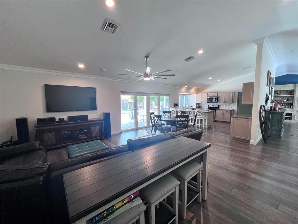 3300 Bridge Road Cooper City, FL 33026 - Photo 6 of 30 a living room with furniture and a flat screen tv
