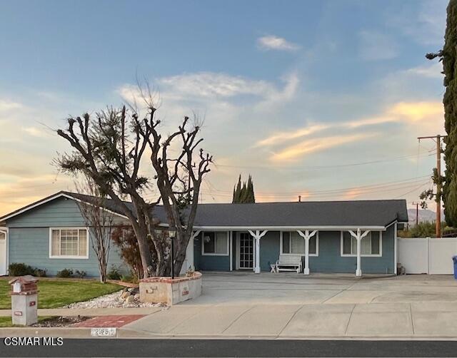 2675 Lembert Street Simi Valley, CA 93065 - Photo 1 of 30 a front view of a house with a yard
