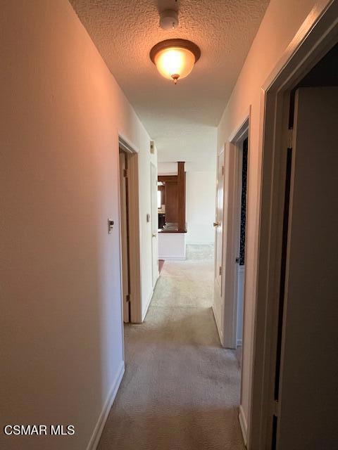 2675 Lembert Street Simi Valley, CA 93065 - Photo 14 of 30 a view of a hallway with wooden floor