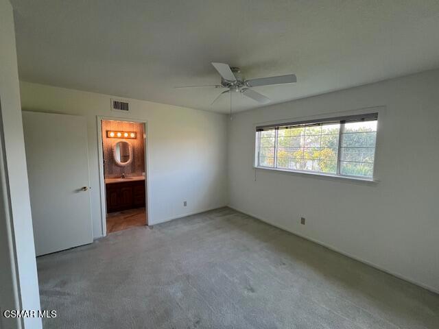 2675 Lembert Street Simi Valley, CA 93065 - Photo 16 of 30 an empty room with windows and cabinet