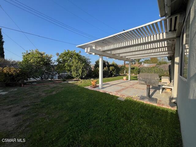 2675 Lembert Street Simi Valley, CA 93065 - Photo 21 of 30 a view of a house with a swimming pool