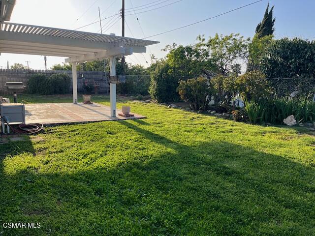 2675 Lembert Street Simi Valley, CA 93065 - Photo 22 of 30 a view of a house with a yard and sitting area
