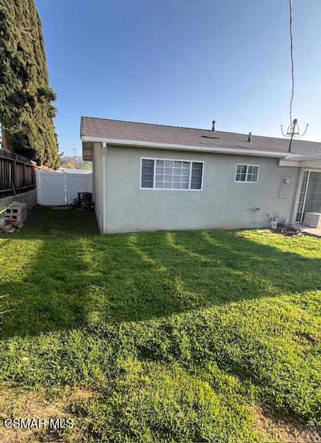 2675 Lembert Street Simi Valley, CA 93065 - Photo 23 of 30 a view of a house with a yard