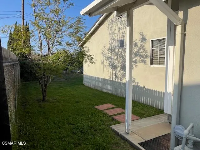 a view of a porch with a yard