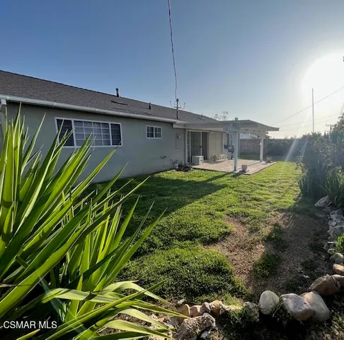 a backyard of a house with lots of green space