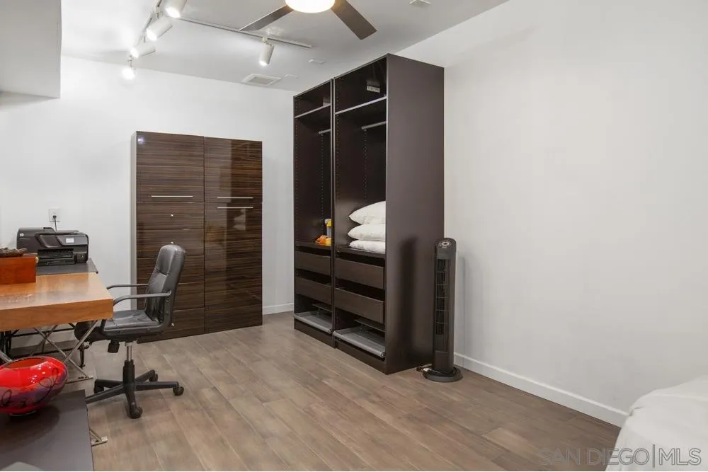 2331 Caringa Way, Unit 38 Carlsbad, CA 92009 - Photo 21 of 26 a workspace with furniture and a window