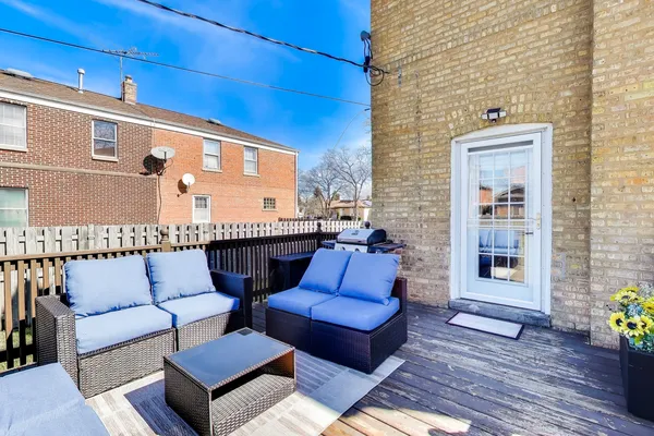 a balcony with furniture