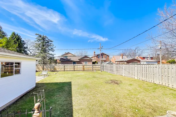 a view of residential houses with swimming pool