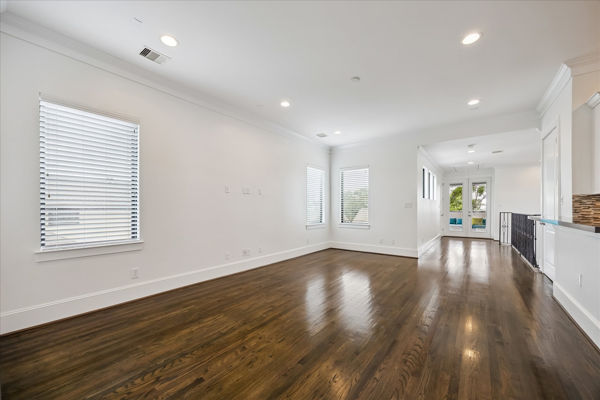 1208 Welch Street Houston, TX 77006 - Photo 26 of 35 The upstairs living space is large an open. And it's so nice that it's on the third floor, not the fourth. A three-story home with first floor living and third floor entertaining space is a rare find in the area!