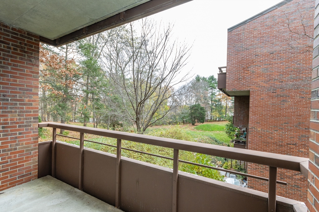 241 Perkins Street, Unit D302 Boston, MA 02130 - Photo 24 of 31 a view of a balcony with an outdoor space