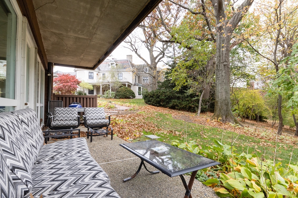 241 Perkins Street, Unit D302 Boston, MA 02130 - Photo 30 of 31 a outdoor space with patio lots of furniture